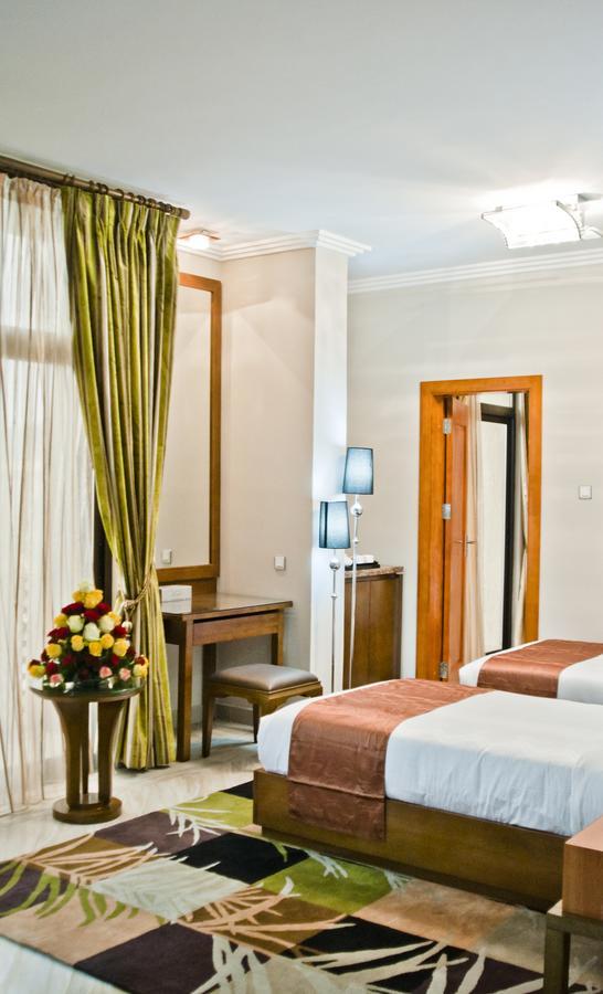 South Star International Hotel Ауаса Стая снимка